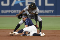 Tampa Bay Rays' Josh Lowe steals second beating the tag of Pittsburgh Pirates shortstop Oneil Cruz during the second inning of a baseball game Friday, June 24, 2022, in St. Petersburg, Fla. (AP Photo/Scott Audette)