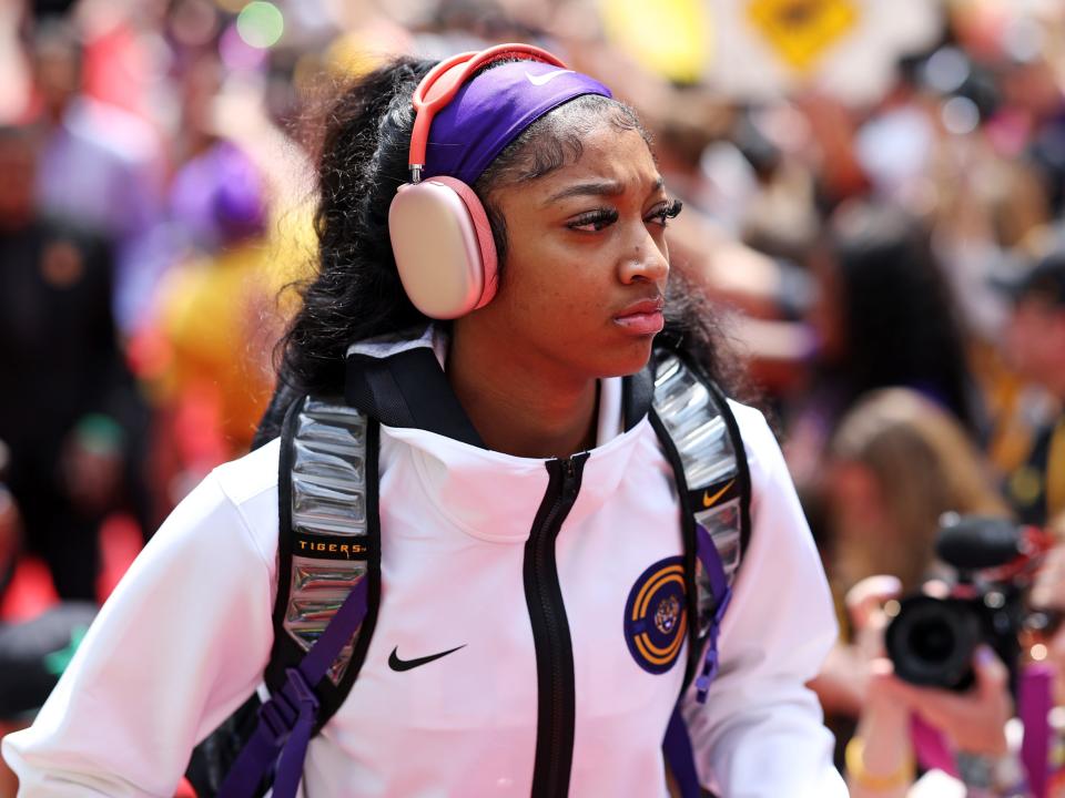 Angel Reese #10 of the LSU Lady Tigers enters the stadium on the red carpet before playing against the Iowa Hawkeyes during the 2023 NCAA Women's Basketball Tournament championship game at American Airlines Center on April 02, 2023 i