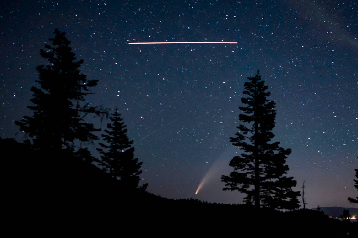 San Luis Obispo photographer Dave Fleishman shot this photo of the NEOWISE comet with the International Space Station flying overhead in the skies above Lake Tahoe.