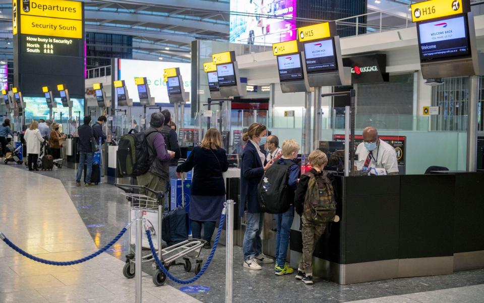 People at the bag drop at Heathrow terminal five, as flights reopen to green-list countries - Geoff Pugh for The Telegraph