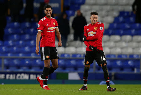 Soccer Football - Premier League - Everton vs Manchester United - Goodison Park, Liverpool, Britain - January 1, 2018 Manchester United's Jesse Lingard and Marcus Rashford celebrate after the match REUTERS/Andrew Yates