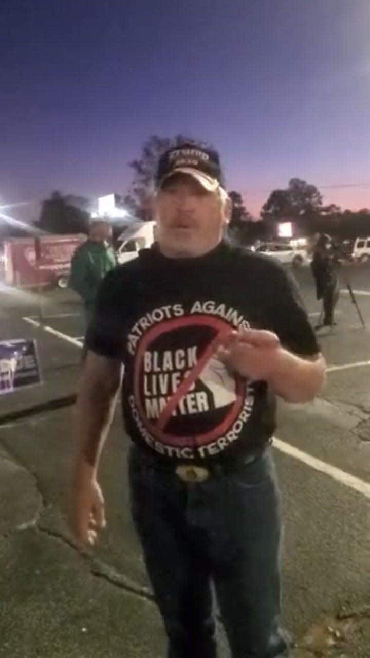 James Stachowiak posted video of himself on Twitter at a Dec. 9 rally for U.S. Sen. David Perdue. The extremist is charged with disorderly conduct after an incident that day at a grocery store. [Screenshot/James Stachowiak]