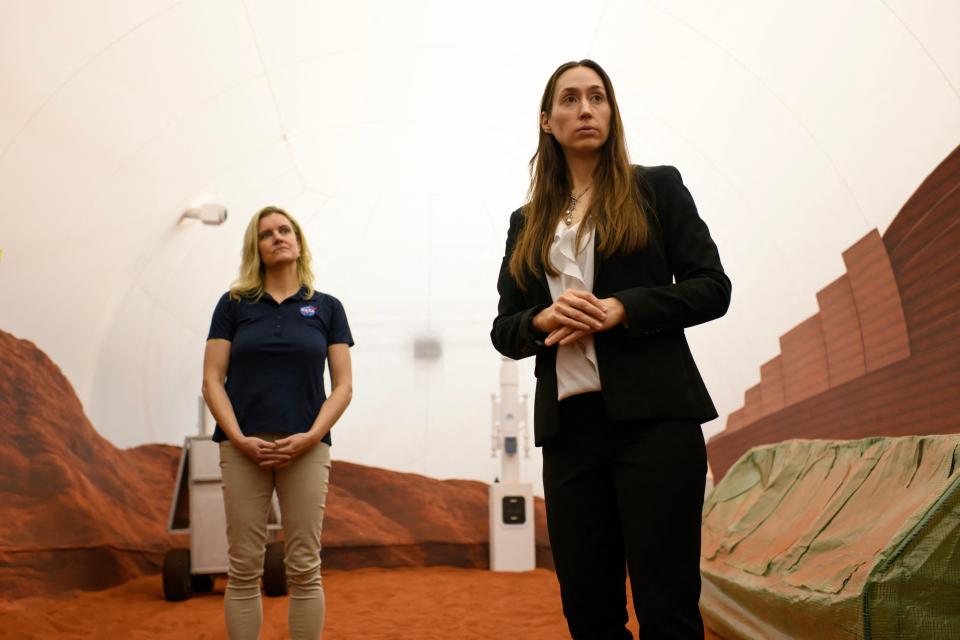 Dr. Suzanne Bell (left), Lead for NASA's Behavioral Health and Performance Laboratory, and Dr. Grace Douglas (right), CHAPEA principal investigator, answer questions from the media in a simulated Mars exterior portion of the CHAPEA's Mars Dune Alpha at the Johnson Space center in Houston, Texas on April 11, 2023.
