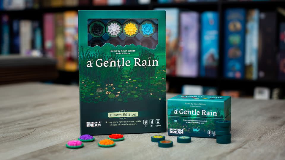 This edition of A Gentle Rain was made by Incredible Dream for the mass consumer market. It includes plastic flowers instead of wooden tokens. - Incredible Dream