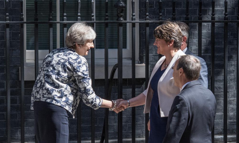 Theresa May greets Arlene Foster outside No 10.