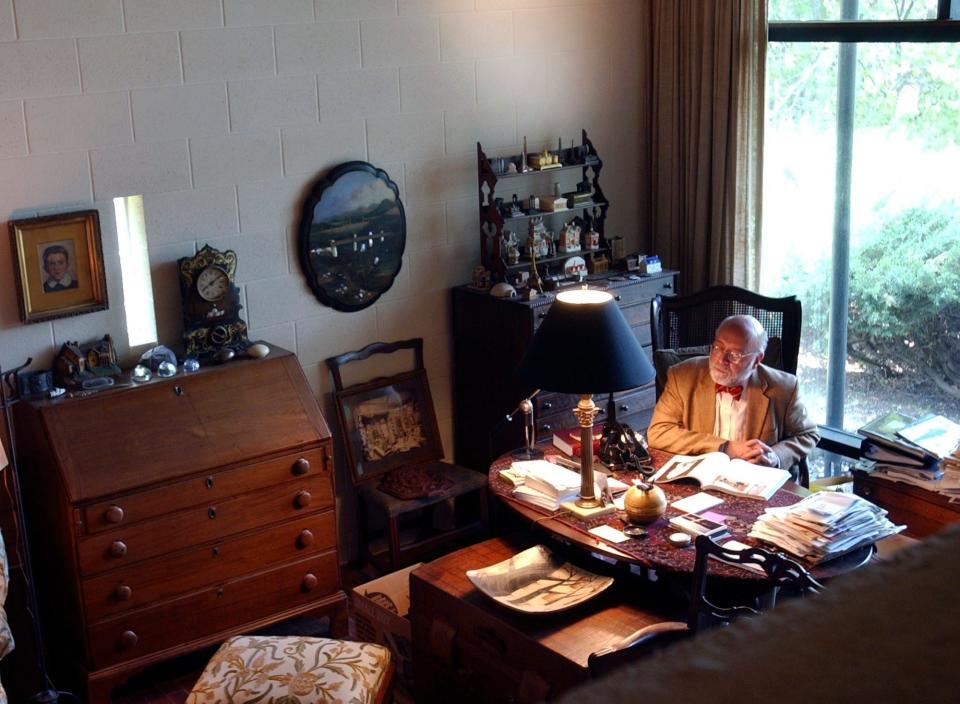 At his desk in the library of his Marcel Breuer house - Star Tribune via Getty Images