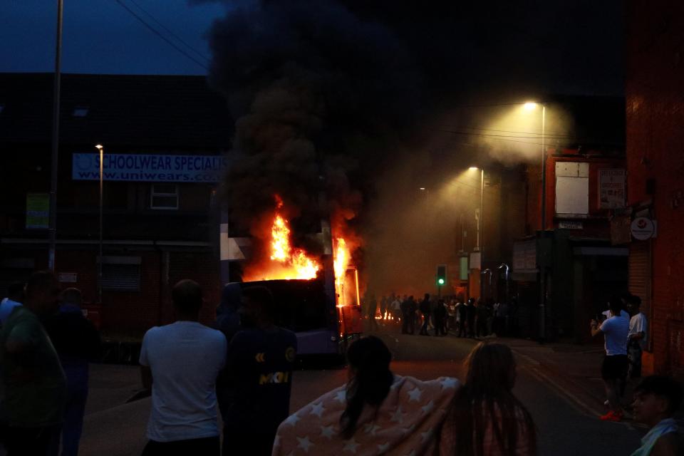 A bus burns during unrest in Harehills, Leeds, Britain, July 18, 2024 in this picture obtained from social media (â€œ@robin_singhâ€ via REUTERS)
