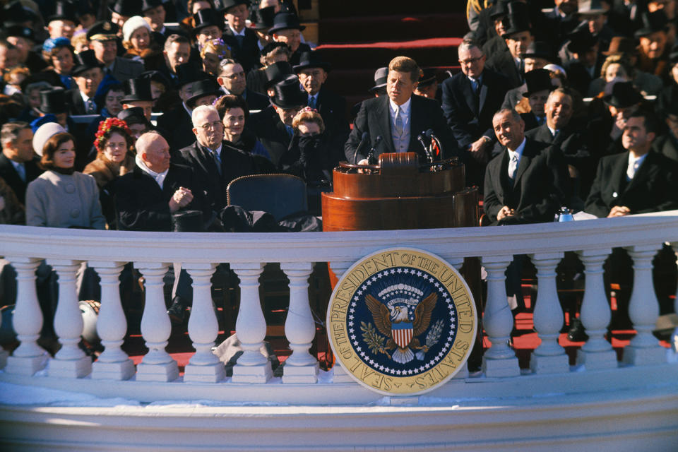 <p>President John F. Kennedy makes his inauguration speech from the balcony of the White House in Washington, Jan. 20, 1961. (Photo: Bettmann Archive/Getty Images) </p>