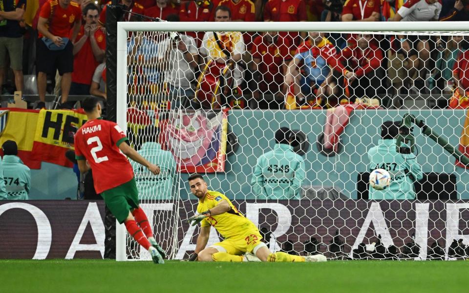 Morocco's Achraf Hakimi scores the winning penalty during the penalty shootout - Dylan Martinez/Reuters