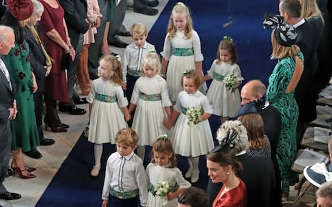 The bridesmaids and page boys arrive for the wedding of Princess Eugenie to Jack Brooksbank  - Credit: PA