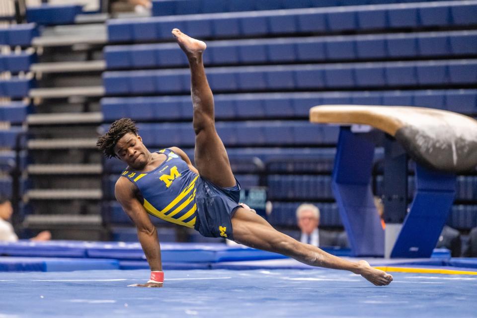 Stoughton's Frederick Richard competes as the University of Michigan men's gymnastics team earned second place in NCAA Tournament at Rec Hall in State College, Pennsylvania, on April 15, 2023.