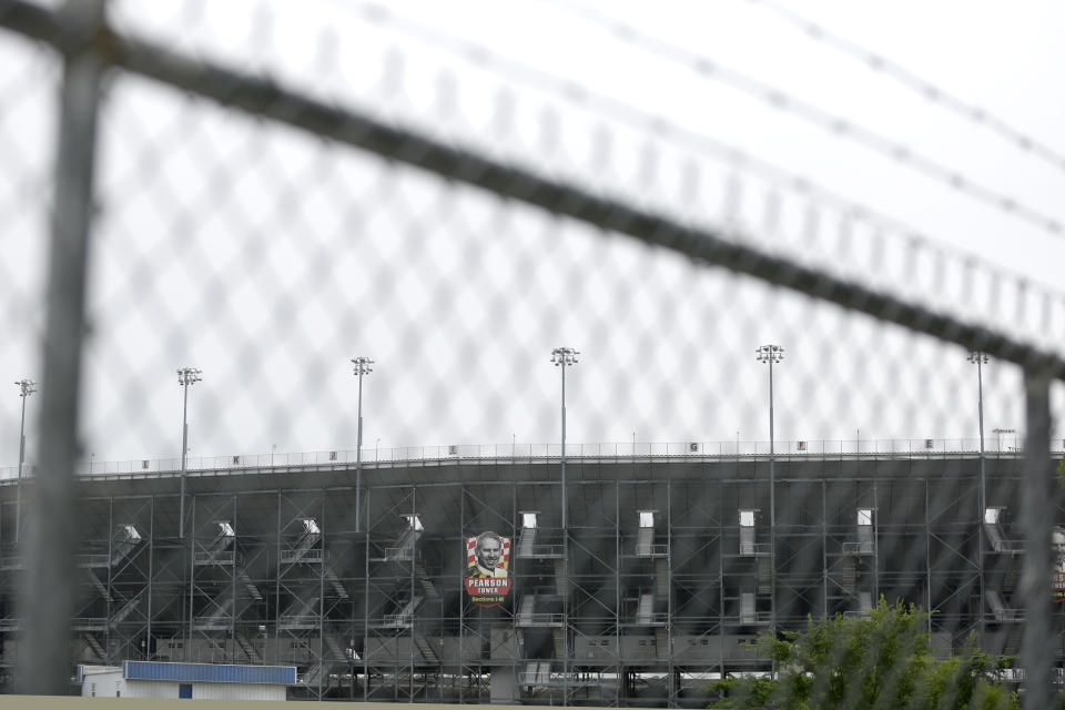 A part of the Darlington Raceway grandstand is void of fans Sunday, May 17, 2020, in Darlington, S.C. NASCAR, which has been idle since March 8 because of the coronavirus pandemic, makes its return with the Real Heroes 400 Nascar Cup Series auto race Sunday. No spectators are allowed, and race teams are only permitted 16 individuals per car, including the driver, owner, crew chief, crew members, spotter and hauler driver. (AP Photo/Brynn Anderson)