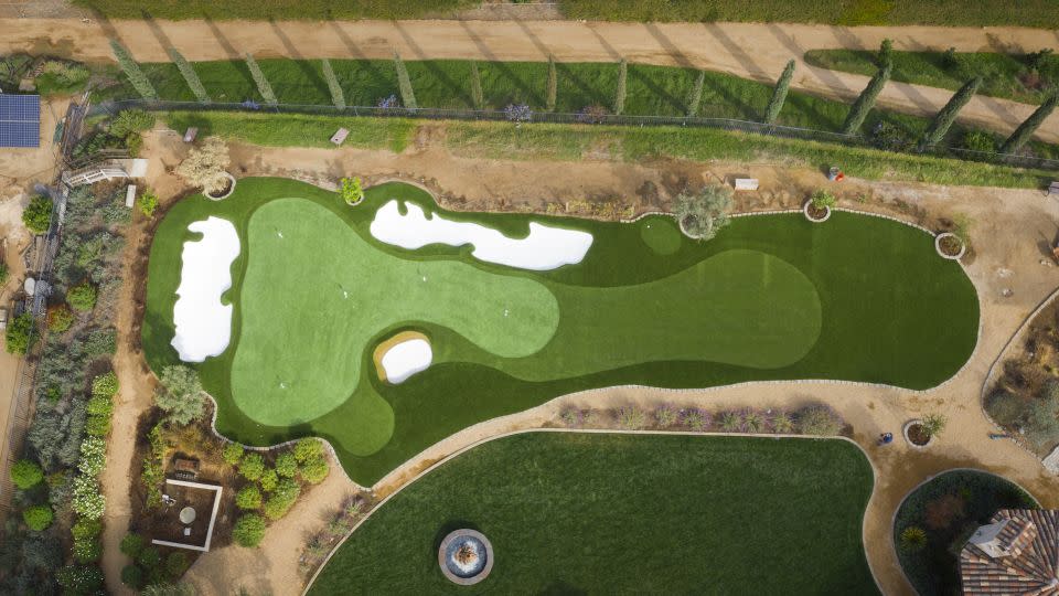 Putting greens are tailored to fit the specifications of a buyer's backyard. - Back Nine Greens