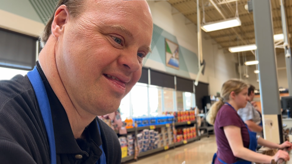 Todd Harris is the friendly face you see when checking out at Kroger off North Canton Center Road in Canton. / Credit: CBS Detroit