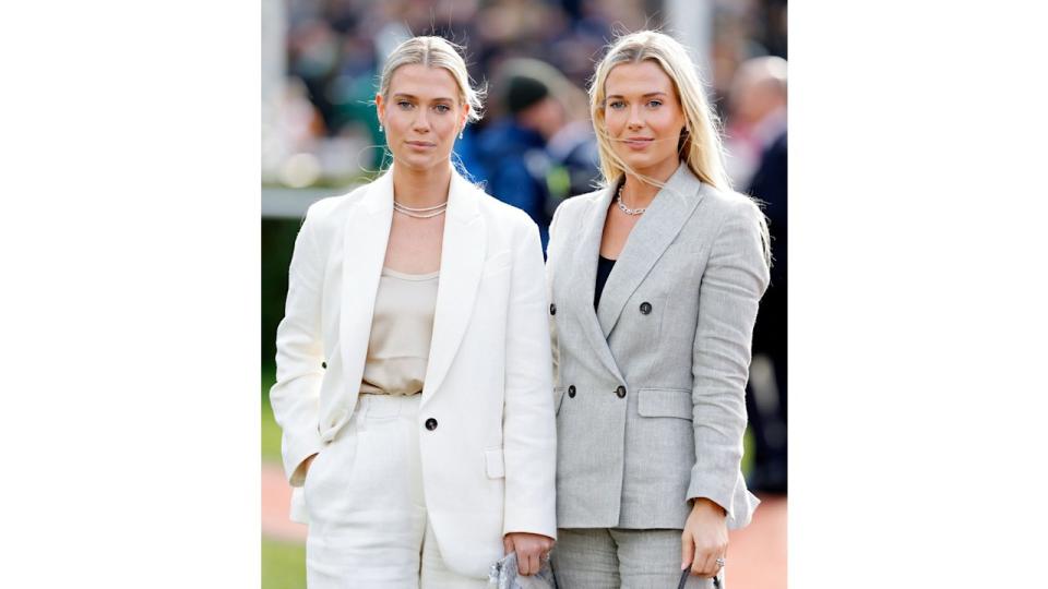 eliza and amelia in neutral suits