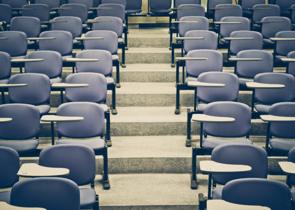 An empty college lecture hall.