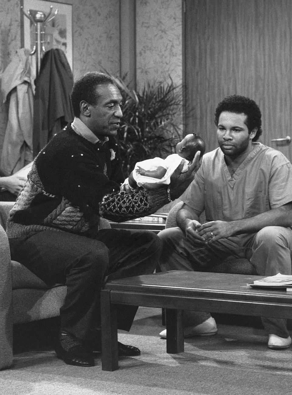 Geoffrey Owns with Bill Cosby in 1988. (Photo: NBCU Photo Bank)