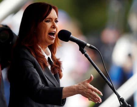 Former Argentine President Cristina Fernandez de Kirchner speaks during a rally outside the Federal Justice building where she attended court in Buenos Aires, Argentina, in this picture taken April 13, 2016. REUTERS/Marcos Brindicci