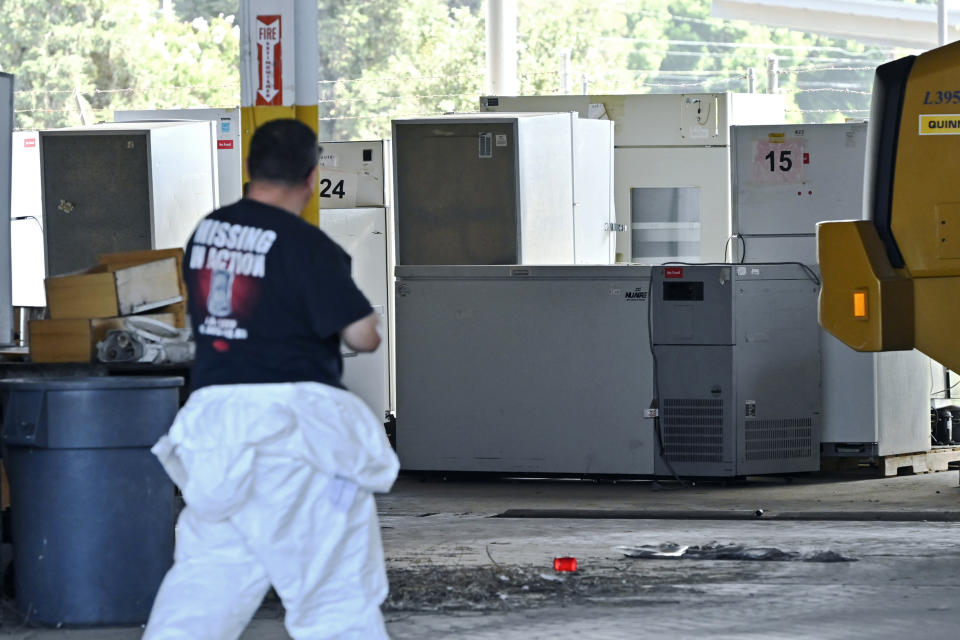 FILE - Refrigeration units are seen collected outside a warehouse that housed a now-shuttered medical lab owned by Chinese business people and that officials say was operating illegally in Reedly, Calif., Aug. 1, 2023. Bei Zhu, 62, the Chinese owner of an unauthorized central California lab that fueled conspiracy theories about China and biological weapons was, Thursday, Oct. 19, 2023, arrested on charges of not obtaining the proper permits to manufacture tests for COVID-19, pregnancy and HIV, and mislabeling some of the kits. (Eric Paul Zamora/The Fresno Bee via AP, File)