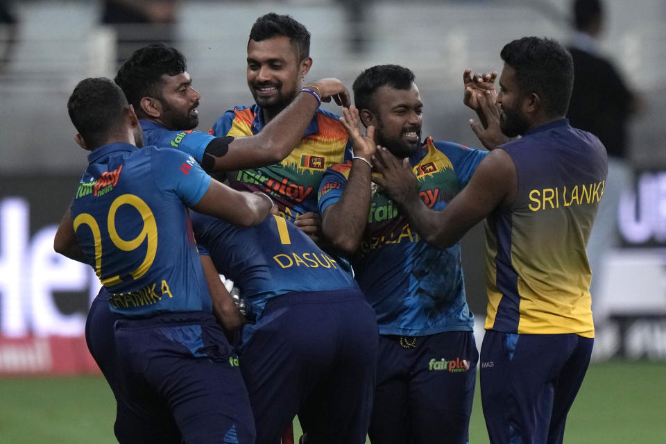 Sri Lankan players celebrate after their win in the T20 cricket match of Asia Cup against India, in Dubai, United Arab Emirates, Tuesday, Sept. 6, 2022. (AP Photo/Anjum Naveed)
