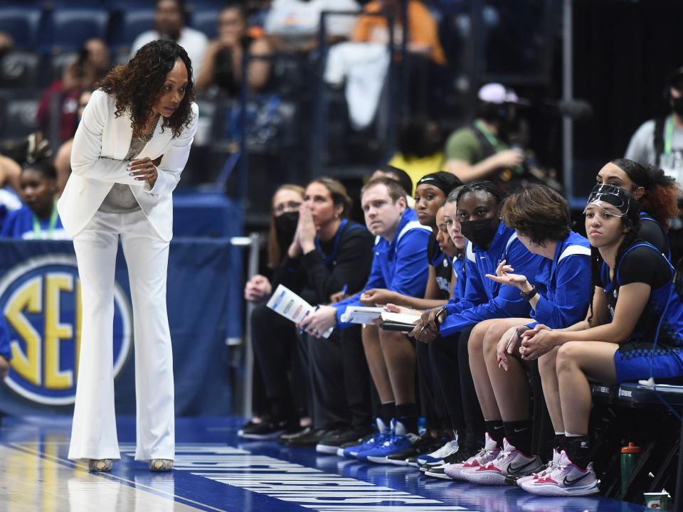 Kentucky women's basketball coach Kyra Elzy with her bench during the SEC women's basketball championship game against South Carolina on March 6.