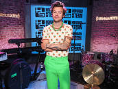 <p>Harry Styles gets ready to spill — and sing — while visiting <em>The Howard Stern Show</em> at SiriusXM Studios in N.Y.C. on May 18.</p>