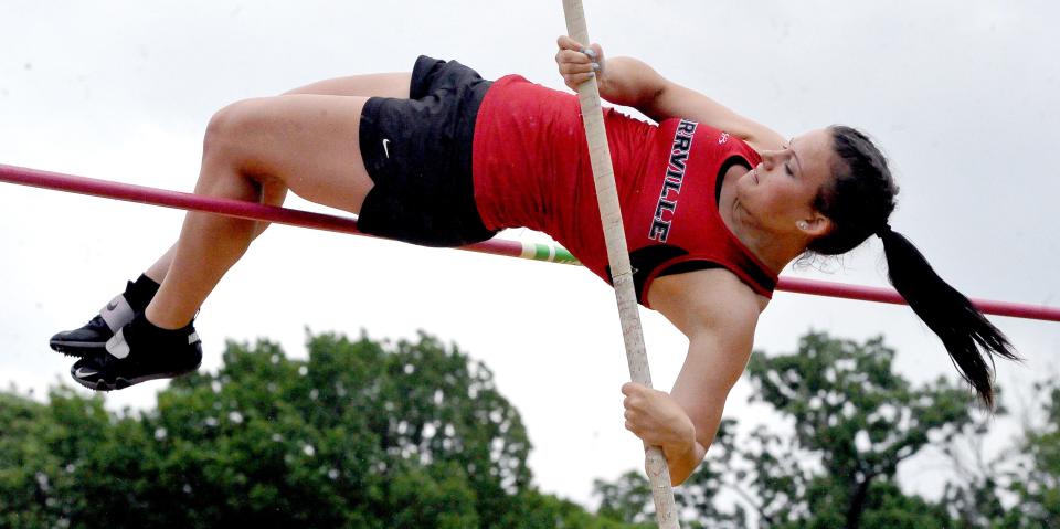 Orrville's Catrina Race just clears the bar in the pole vault.