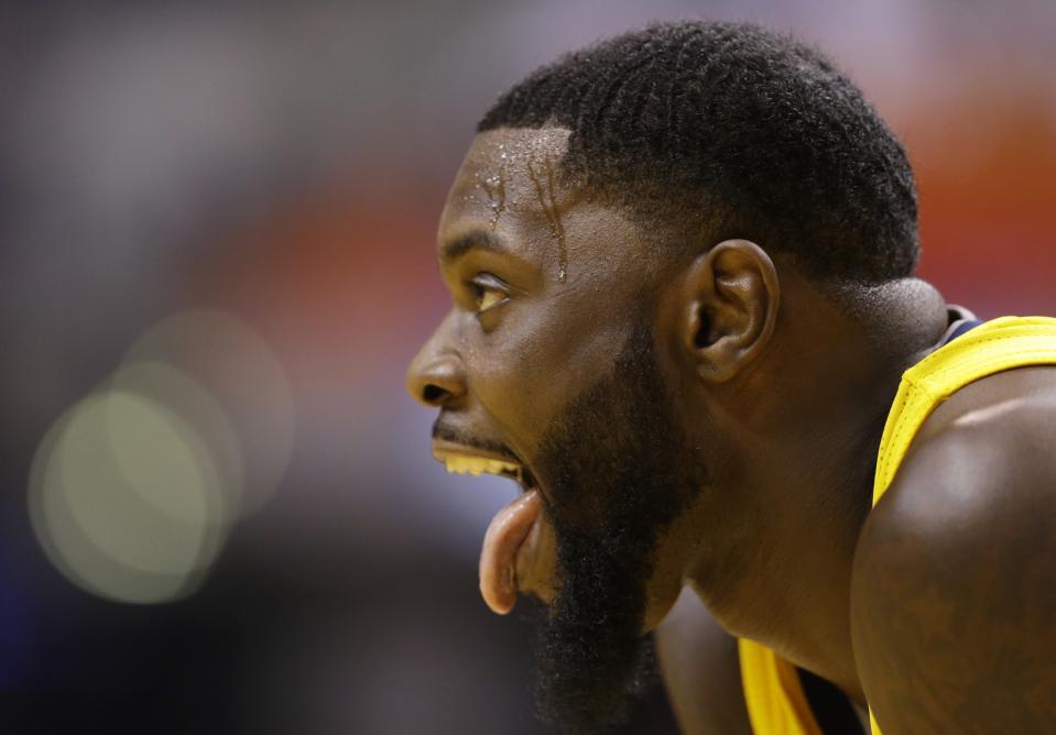 Lance Stephenson makes a face during a break in the second half of the Indiana Pacers' game against the Toronto Raptors on Tuesday. (AP/Michael Conroy)