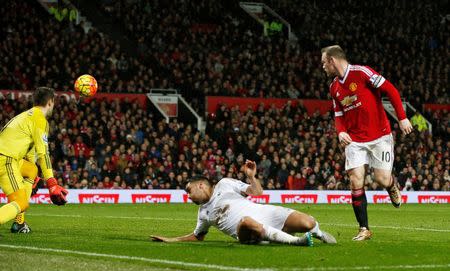 Football Soccer - Manchester United v Swansea City - Barclays Premier League - Old Trafford - 2/1/16 Wayne Rooney scores the second goal for Manchester United Reuters / Andrew Yates Livepic