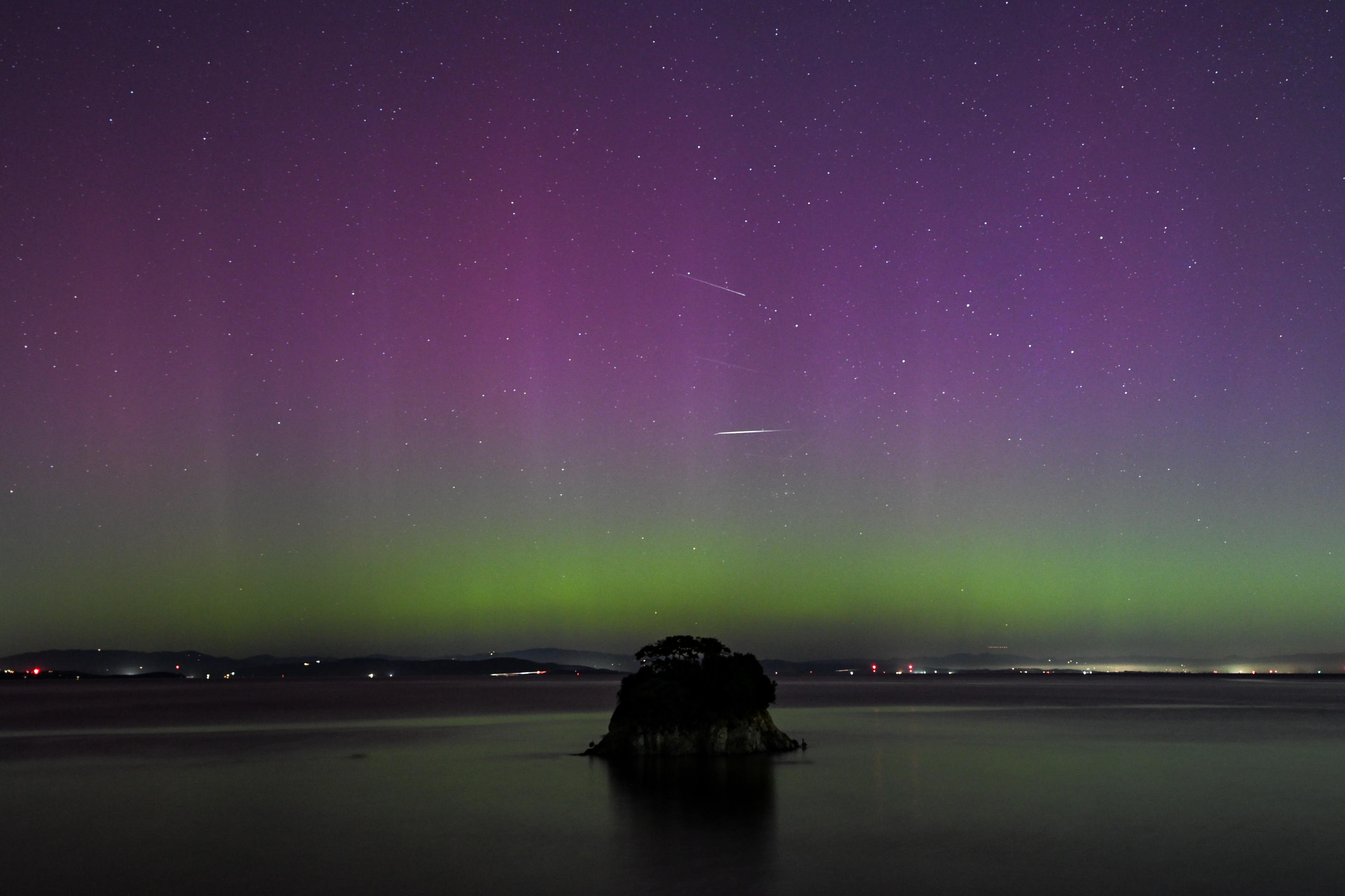 CALIFORNIA, USA - MAY 11: Meteor showers captured during Northern Lights (Aurora Borealis) illuminate the sky of San Francisco North Bay as seen from China Camp Beach in San Rafael, California, United States on May 11, 2024. (Photo by Tayfun Coskun/Anadolu via Getty Images)