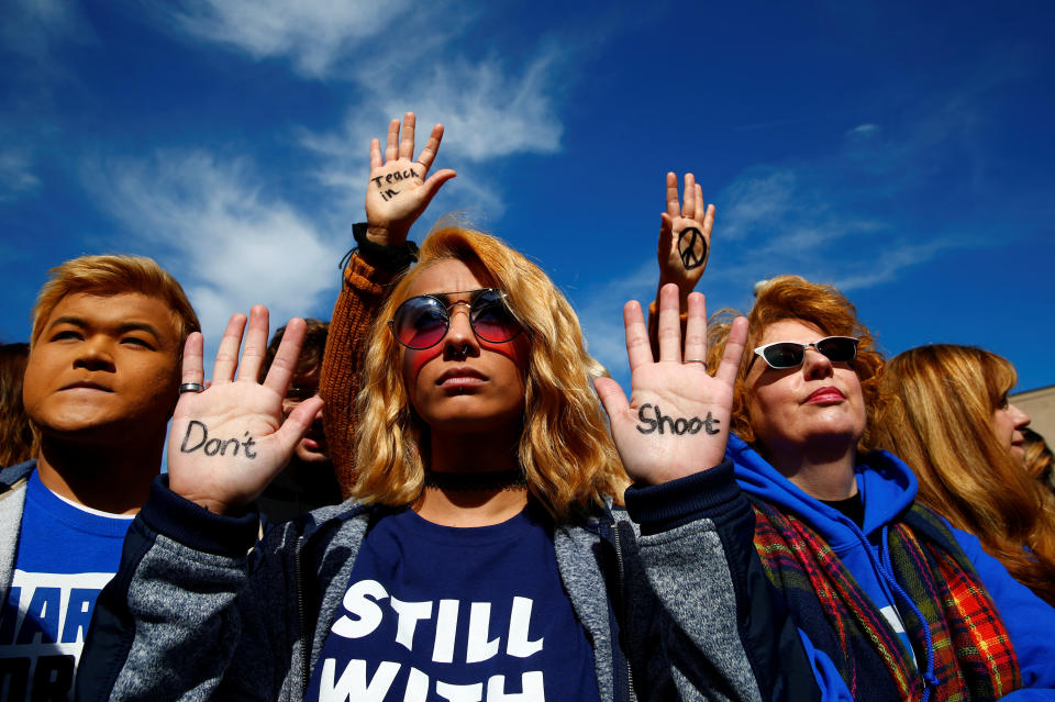 <p>Attendees are seen before students and gun control advocates hold the “March for Our Lives” event demanding gun control after recent school shootings at a rally in Washington, U.S., March 24, 2018. (Eric Thayer/Reuters) </p>