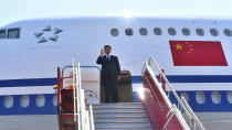 In this handout photo provided by the Indian Ministry of External Affairs, Chinese President Xi Jinping waves to the gathering as he arrives in Chennai, India, Friday, Oct. 11, 2019. Xi arrived in India Friday for a summit with Prime Minister Narendra Modi at a time of tensions over Beijing joining Pakistan in opposing India’s downgrading of Kashmir’s autonomy and the ongoing lockdown in the disputed region. (Indian Ministry of External Affairs via AP Photo)