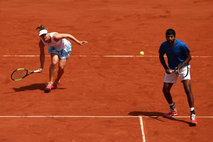 Gabriela Dabrowski of Canada and Rohan Bopanna work to finish strong in their final match of the 2017 French Open against Anna-Lena Groenefeld of Germany and Robert Farah of Columbia. (Getty Images)