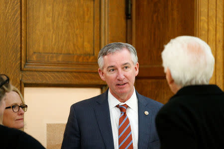 Montgomery County District Attorney Kevin Steele is greeted while leaving the courtroom following a hearing for actor and comedian Bill Cosby's sexual assault trial at the Montgomery County Courthouse in Norristown, Pennsylvania, U.S. March 6, 2018. REUTERS/Brendan McDermid