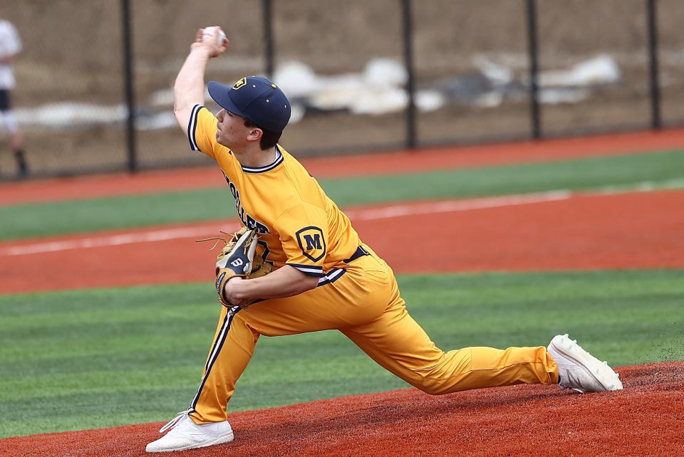 Moeller starting pitcher Toby Hueber throws during the Crusaders win over St. Xavier Wednesday, March 30, 2022.