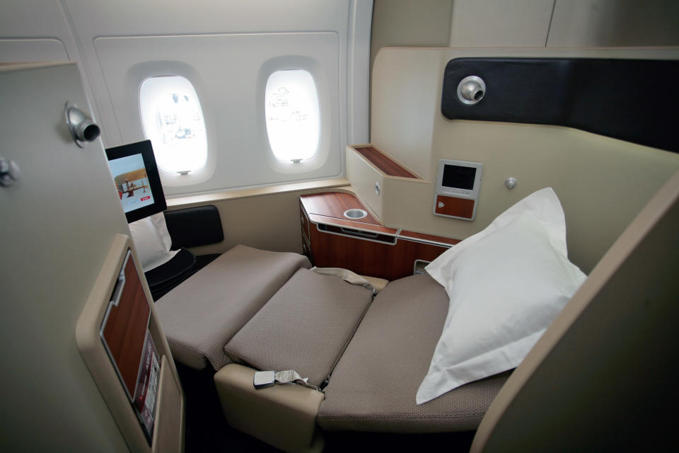 He was sitting in Business Class on the Qantas flight so had a flat bed. Photo: Getty Images