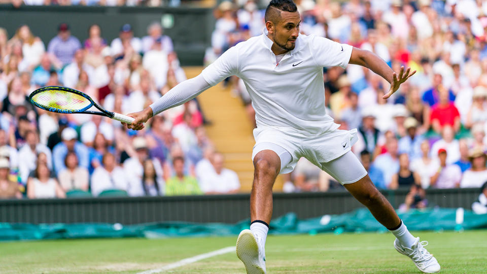 Nick Kyrgios is pictured playing at Wimbledon in 2019.