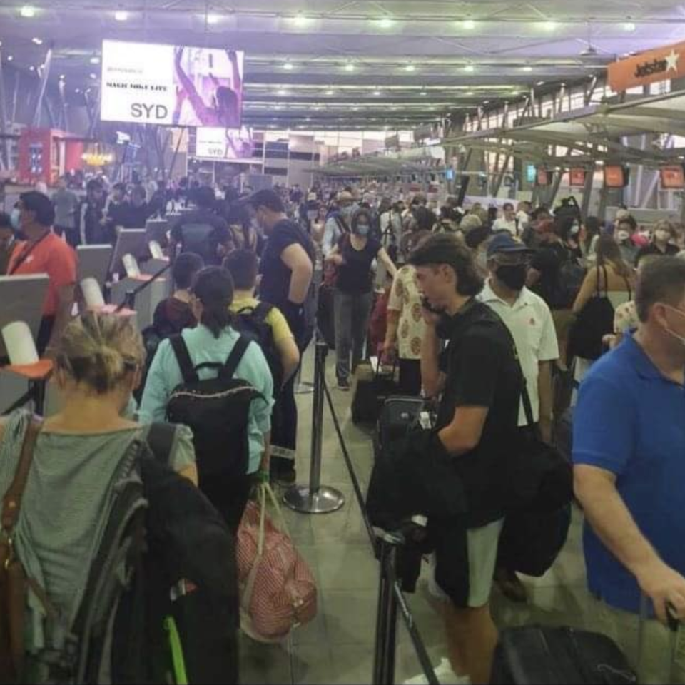 Long queues and huge crowds are seen at Sydney airport. 