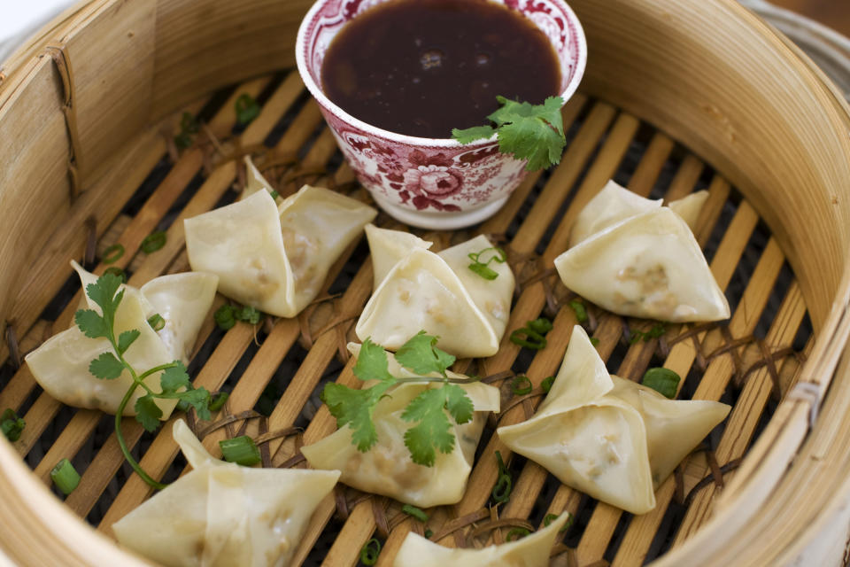 In this image taken on January 14, 2013, vegetarian steamed dumplings with sweet-and-sour sauce are shown in Concord, N.H. (AP Photo/Matthew Mead)