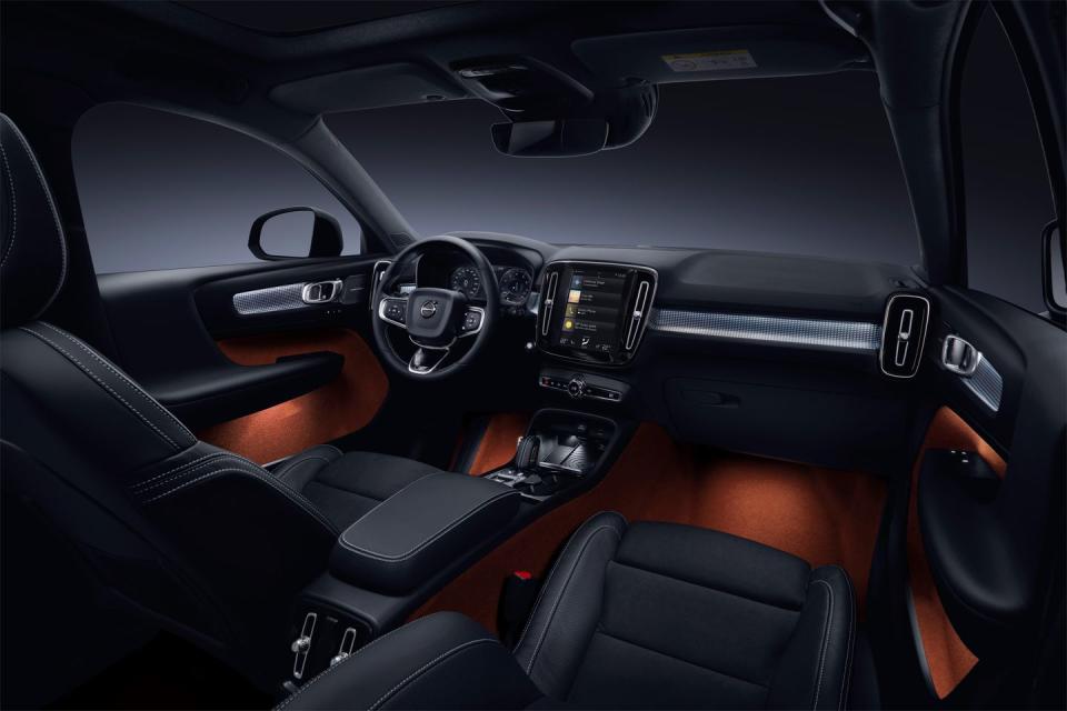 <p>The interior is surprisingly spacious and unique in appearance, another reason the Volvo XC40 stands out among its peers. There is a Swedish sense of cool at play here, along with sensible functionality (<a href="https://www.caranddriver.com/features/g19720019/eight-ways-the-volvo-xc40-suv-is-more-practical-than-its-size-suggests/" rel="nofollow noopener" target="_blank" data-ylk="slk:tons of storage cubbies and versatility baked in;elm:context_link;itc:0;sec:content-canvas" class="link ">tons of storage cubbies and versatility baked in</a>!), both of which make it a pleasant daily driver. The optional Sensus touchscreen display looks slick, although it's not always as responsive to the touch as we would like.</p>