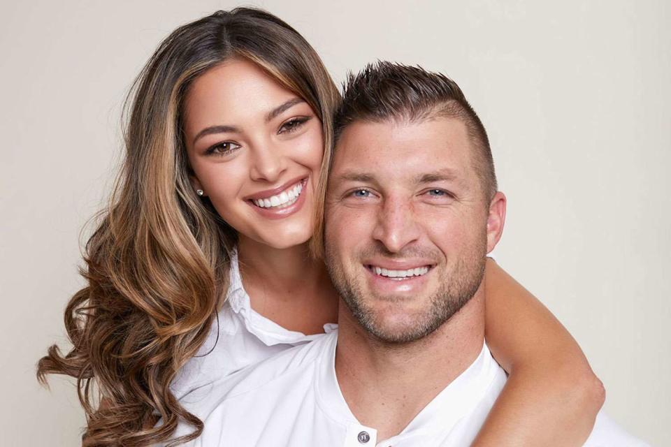 <p>John Hillin </p> Demi-Leigh and Tim Tebow