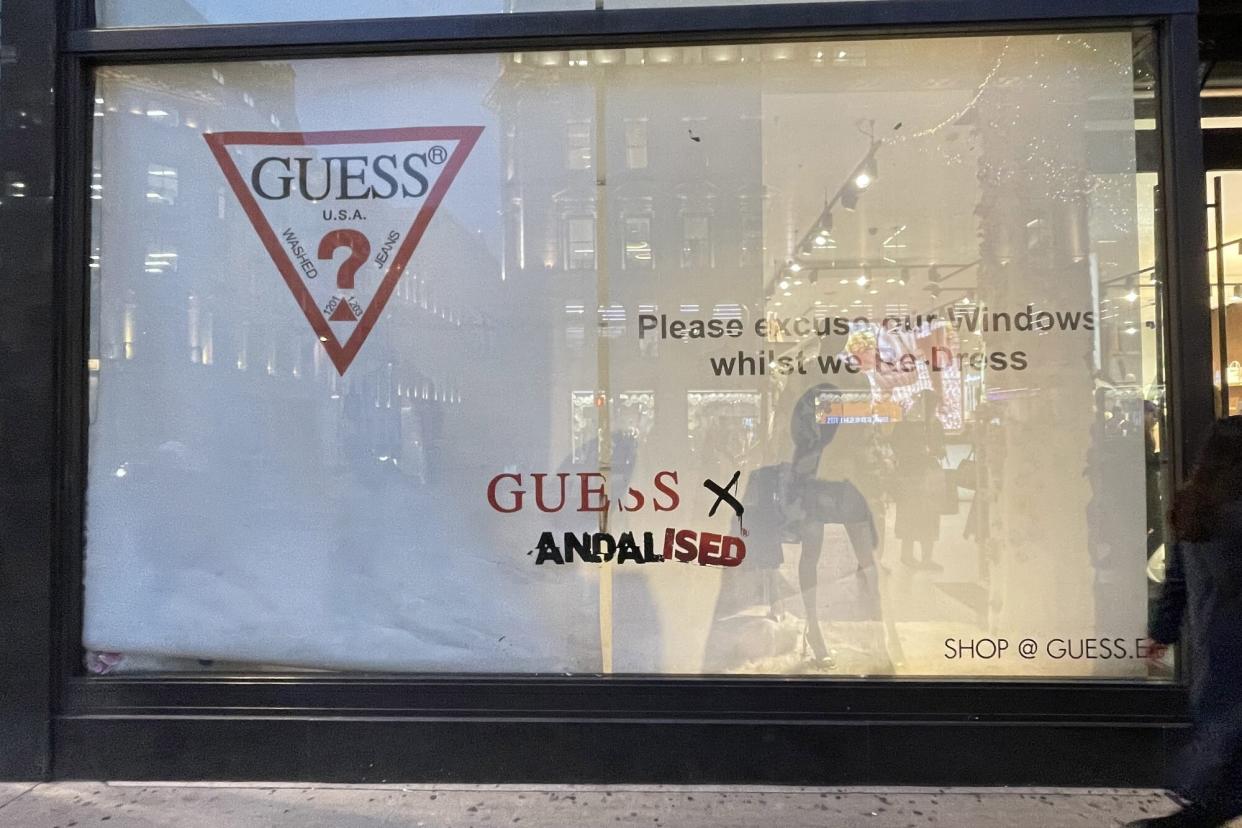 Mandatory Credit: Photo by Rick Findler/Story Picture Agency/Shutterstock (13629314b) GUESS on Regent Street has covered up it's windows after Banksy, the graffiti artist posted a picture of them, using his artwork without permission. Banksy GUESS art covered, London, UK - 18 Nov 2022