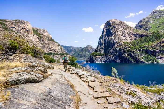 Hiking on the shoreline of Yosemite's Hetch Hetchy Reservoir