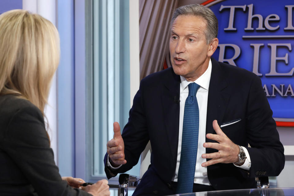 FILE- In this Wednesday, Jan. 30, 2019, file photo former Starbucks CEO Howard Schultz is interviewed by FOX News Anchor Dana Perino for her "The Daily Briefing" program, in New York. Schultz spent more than 30 years at Starbucks, growing a handful of coffee shops into a much-admired global brand. But now, as the billionaire mulls running for president as an independent, Starbucks will have to tread carefully. (AP Photo/Richard Drew, File)