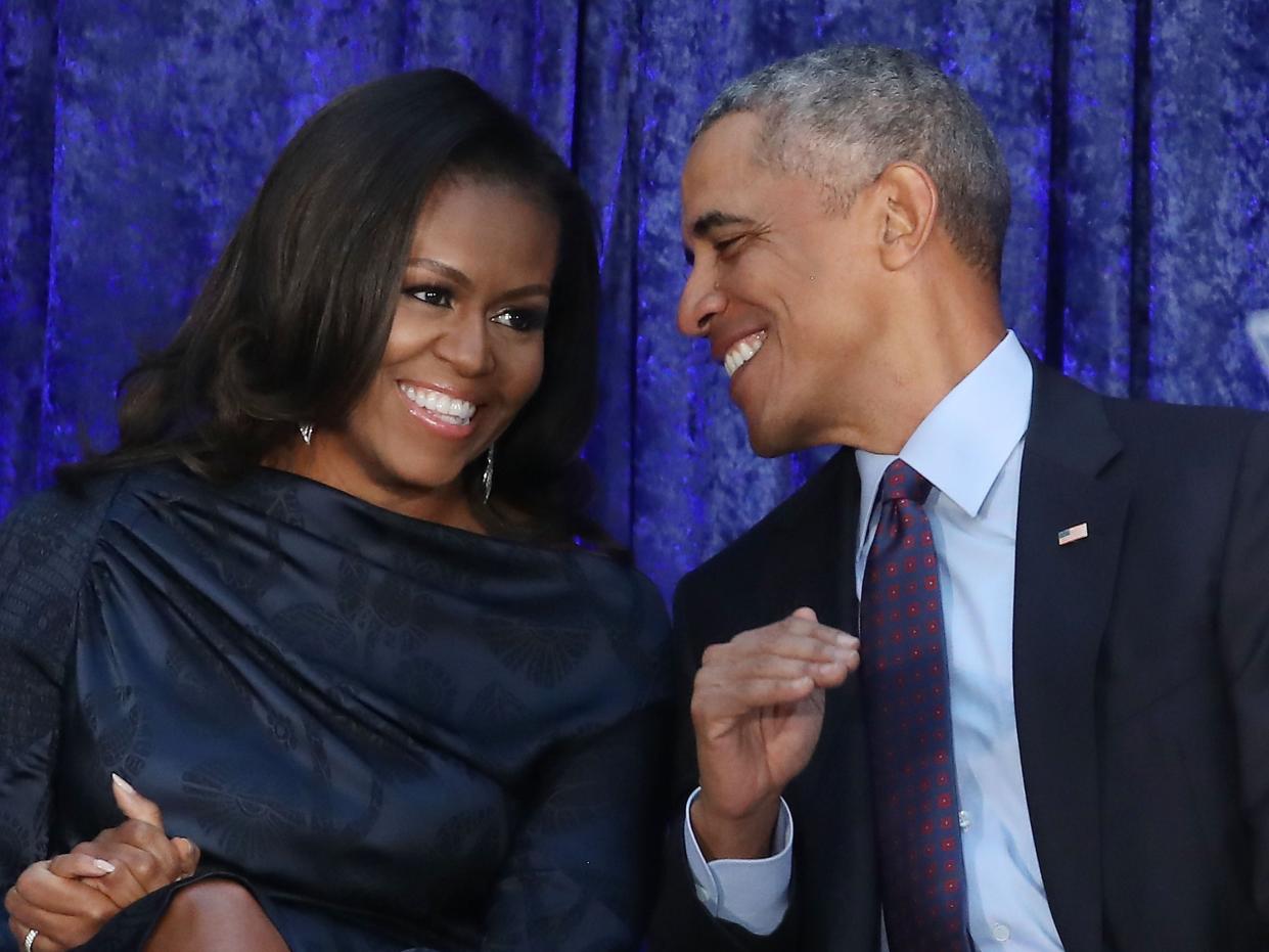 Former US President Barack Obama and first lady Michelle Obama participate in the unveiling of their official portraits (Getty Images)