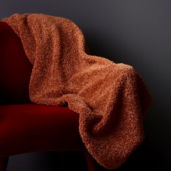 Oui Shaggy Faux-Fur Throw (Photo via Indigo)