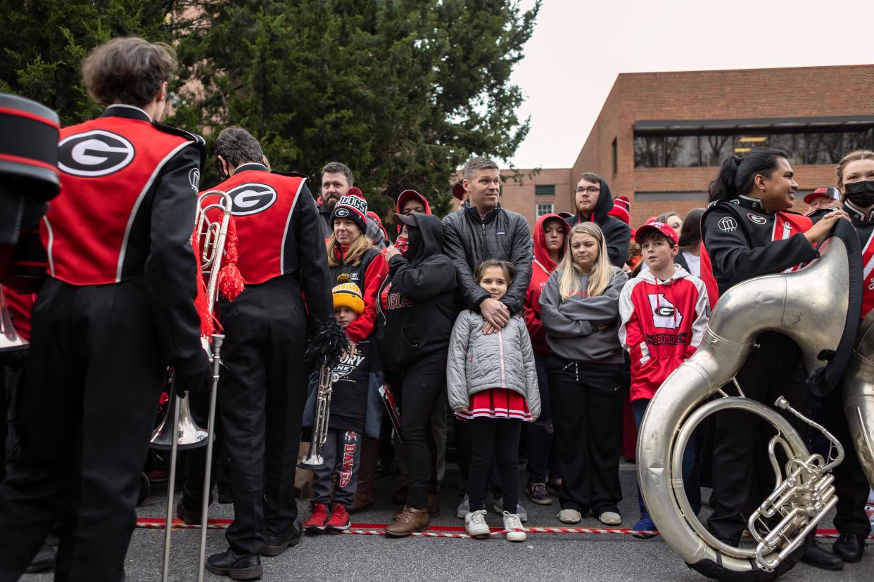 Georgia fans cheer on the Bulldogs during a national championship celebration parade at Sanford Stadium on Saturday, Jan. 15, 2022 in Athens. 
