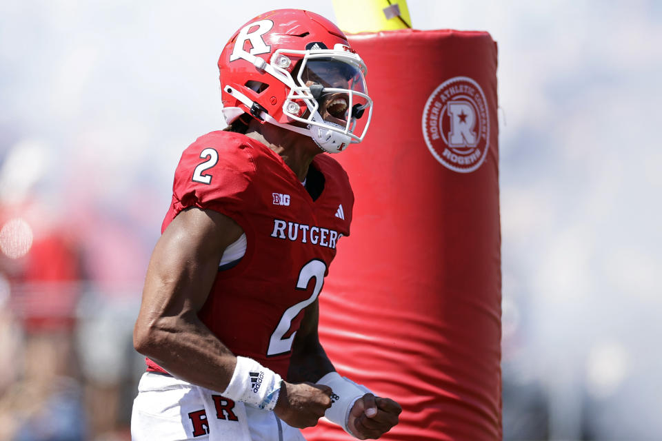 Rutgers quarterback Gavin Wimsatt reacts after scoring a touchdown against Northwestern during the first half of an NCAA college football game, Sunday, Sept. 3, 2023, in Piscataway, N.J. (AP Photo/Adam Hunger)