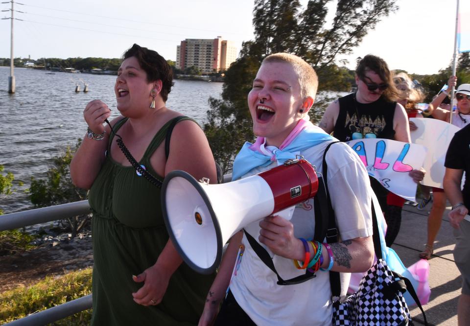 Sebastian Cook led the march in shouts of "Trans rights are human rights." About 250 people gathered at Eau Gallie Square Friday evening to celebrate International Transgender Day of Visibility. The Friday event was organized by Spektrum, a nonprofit LGBTQ healthcare provider with clinics in Orlando and Melbourne.