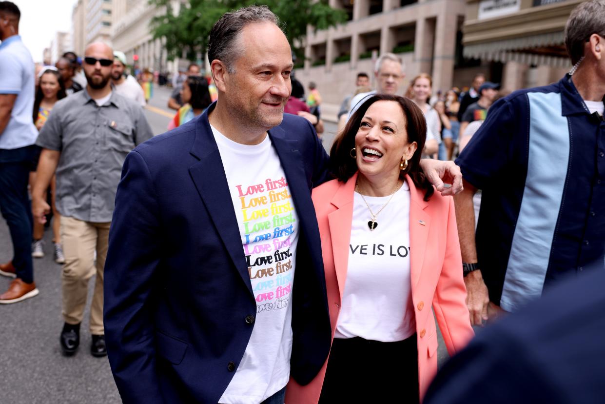 Kamala Harris and husband Doug Emhoff join marchers for the Capital Pride Parade on June 12.